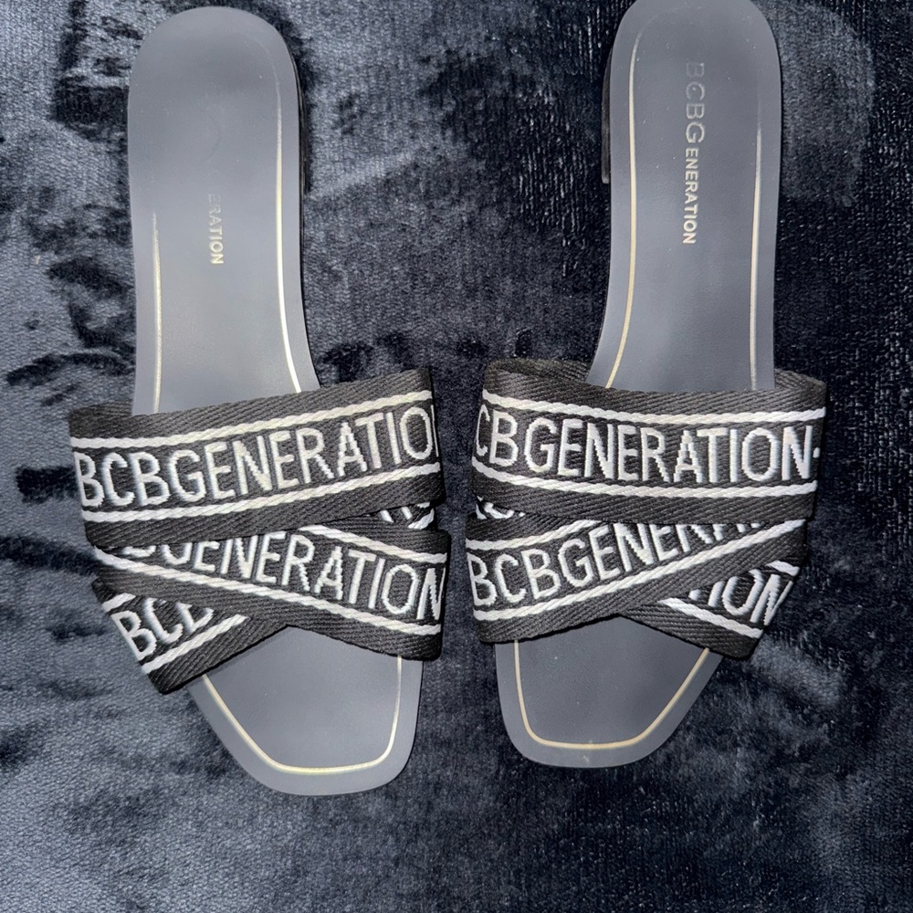 BCBGeneration Black Sandals with Cross-Strap Design
